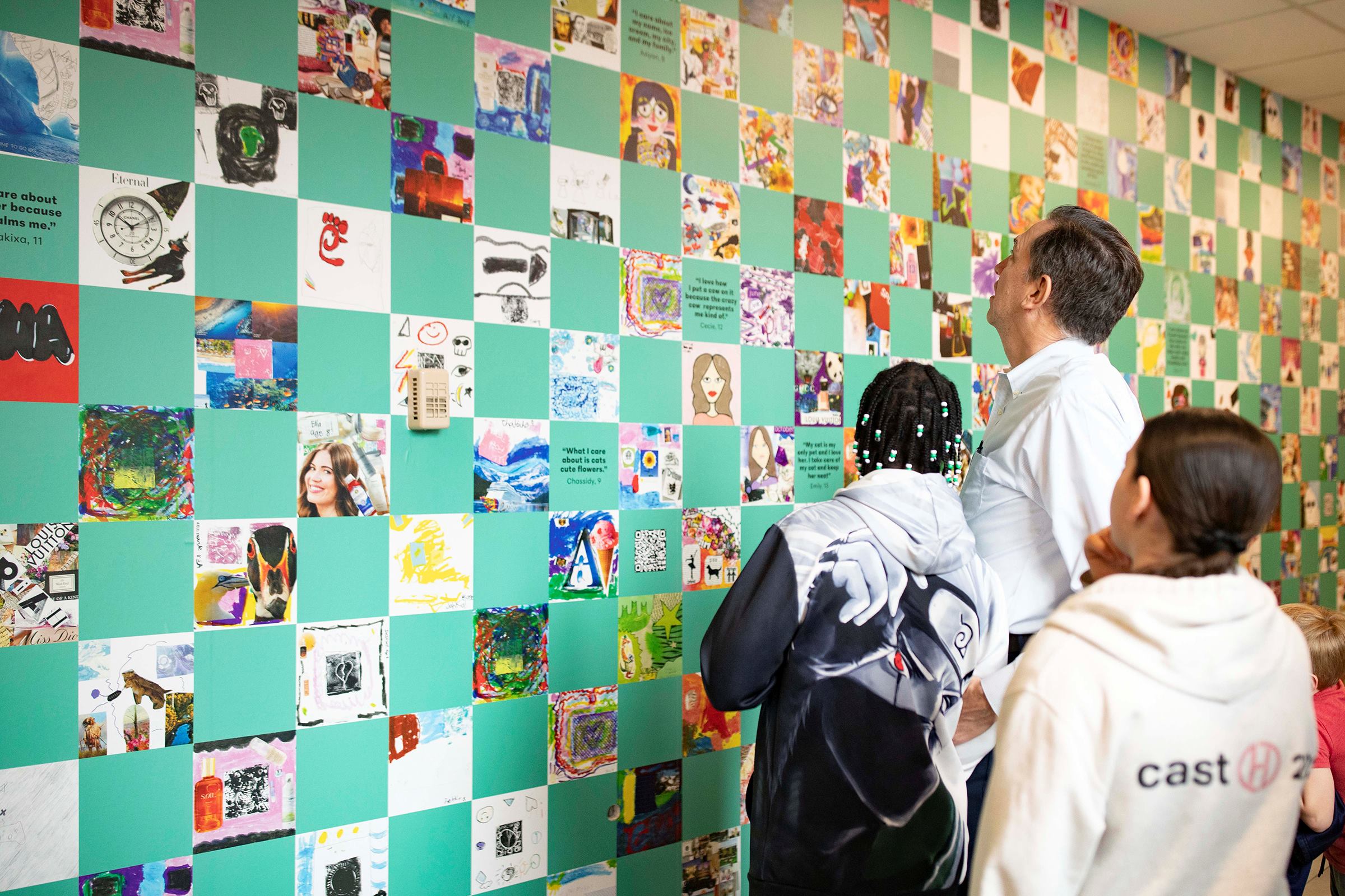 The Philly Cares mural features artwork designed by 288 school students from 15 schools in the Philadelphia region. Each square in the mural represents one of these students and their ideas about who they are and what they care about