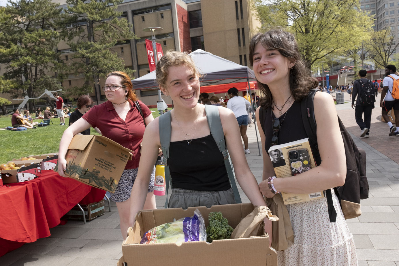 An image of two students smiling after the Share Fair event.